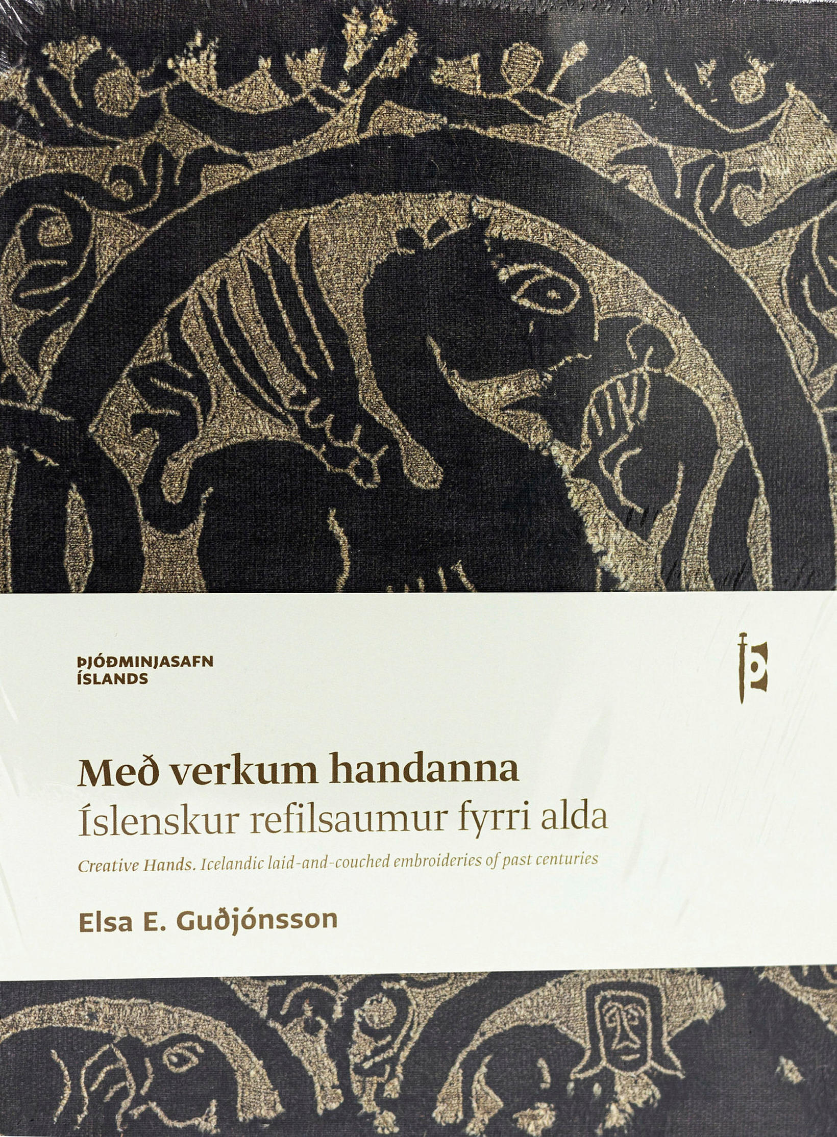 Með verkum handanna eftir Elsu E. Guðjónsson.