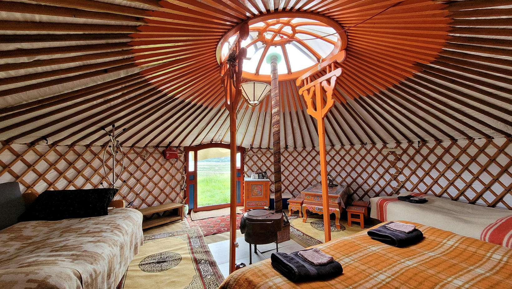 The soft circular form of the yurt is like being …