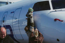 The children enjoyed looking at the airplanes.