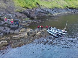 Shortly after Sigurvin reached the fjord, the hikers were spotted.