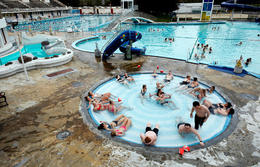 Relaxing in a hot tub at Laugardalslaug swimming pool.