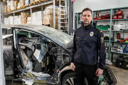 Páll Svansson stands beside a car in which narcotics were found hidden in the sill.
