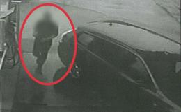 Handtekinn við að búta konuna niður