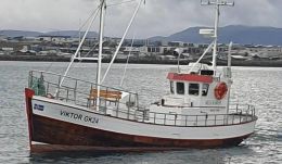 Eikarbátur laskaðist í vitlausu veðri