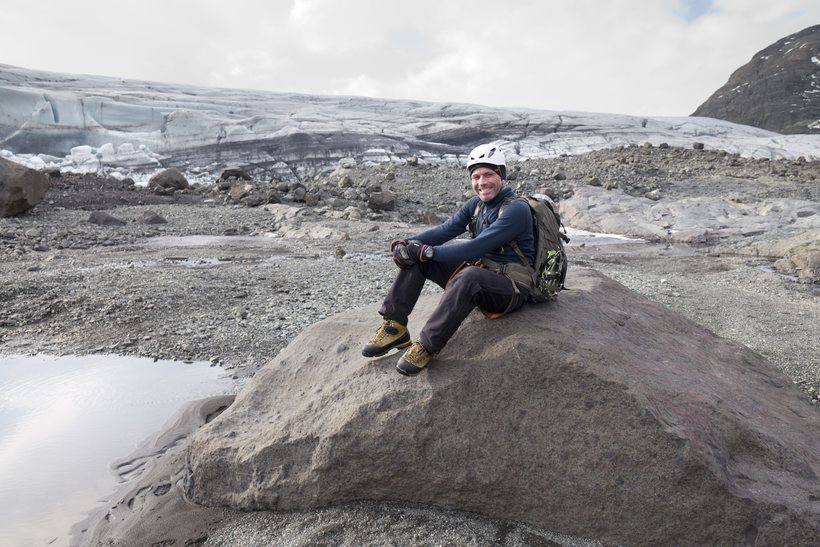 Einar R. Sigurðsson sits on the rock which is now …