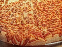 Landsréttur vísar pitsaostamáli frá