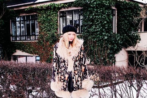 Photographer Saga Sigurðardóttir always looks impeccable whatever the weather. Here she wears a wool and Mongolian lambskin coat by Icelandic designer Hildur Yeoman.