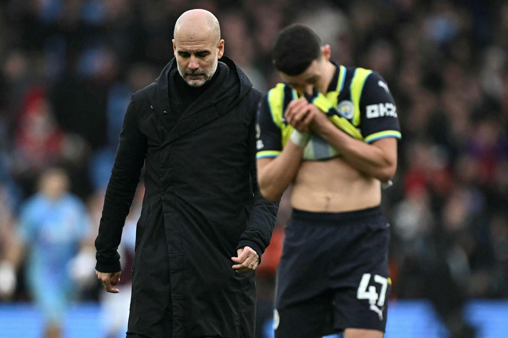 Stjóri liðsins Pep Guardiola og Phil Foden svekktir.