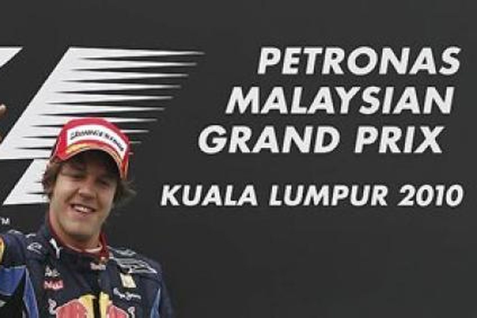 Vettel á efsta pallþrepinu í Sepang.
