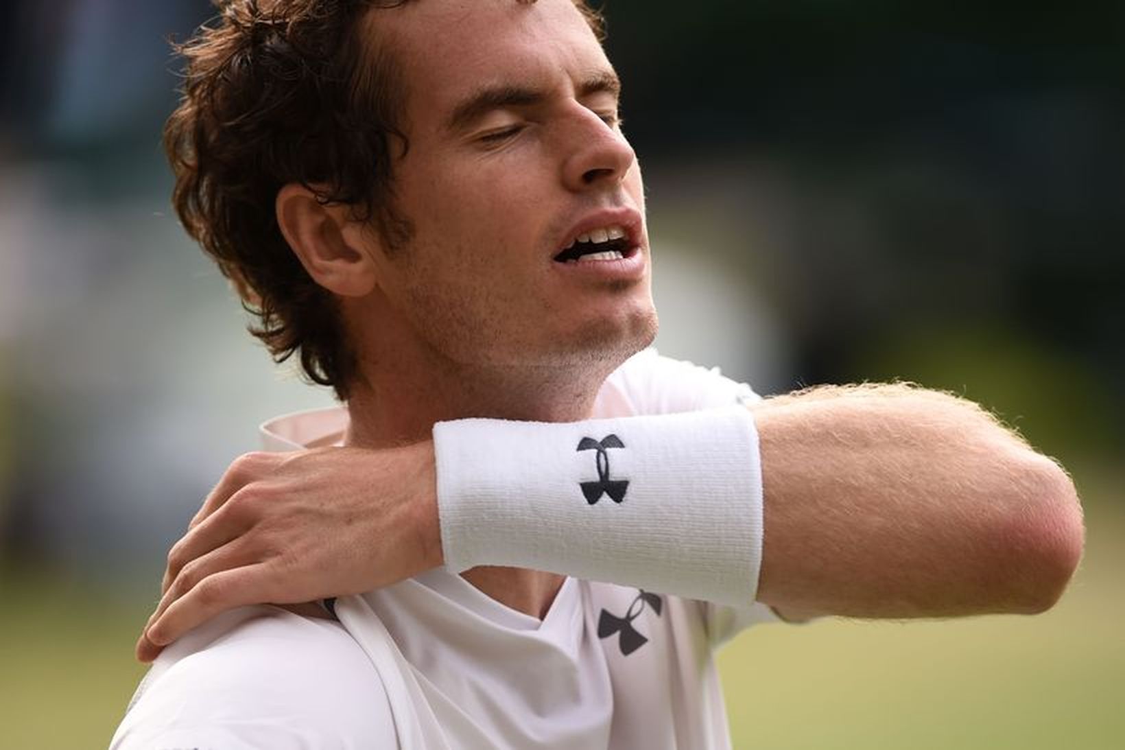 Andy Murray með svitaband áþekkt því sem Camilla fékk.