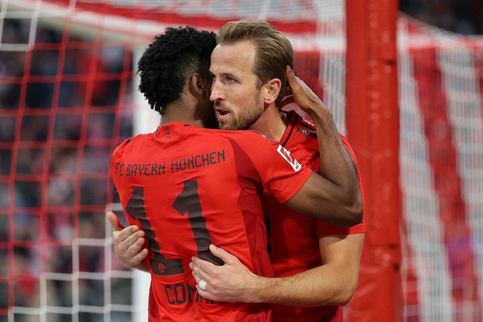 Kane og Coman skoruðu mörk Bayern í dag.