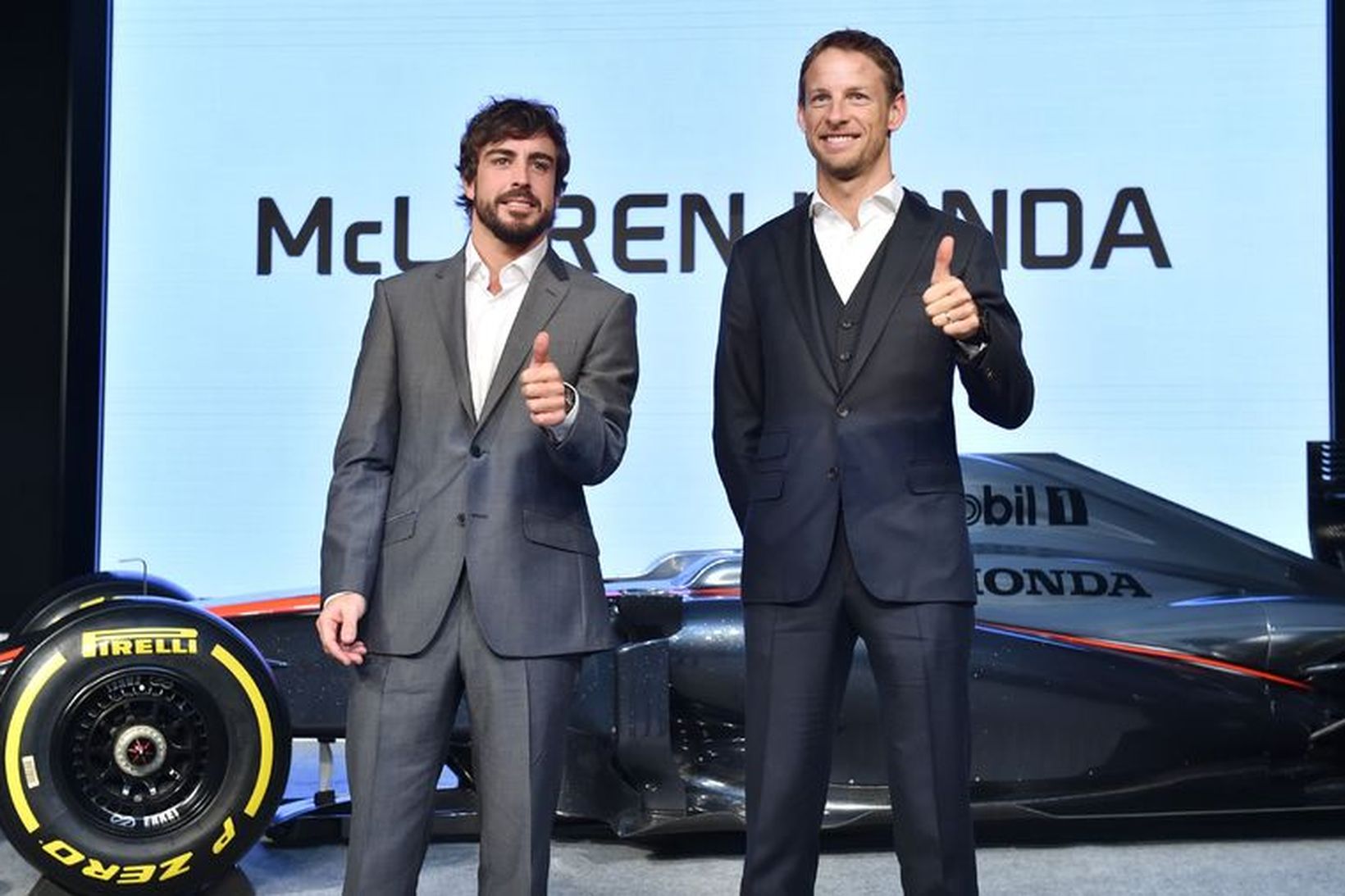 Jenson Button (t.h.) með nýjum liðsfélaga sínum hjá McLaren, Fernando …