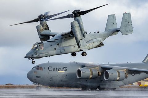 An MV-22 Osprey is in the foreground. The picture is taken at Keflavík International Airport in October of last year.