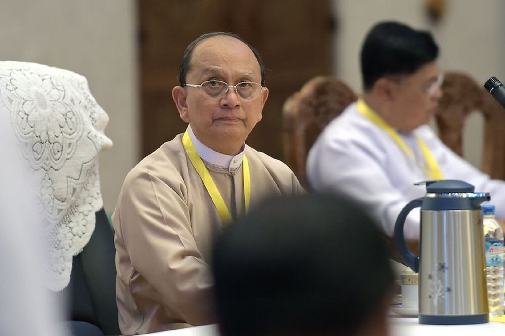 Thein Sein (miðju), fráfarandi forseti Myanmar.