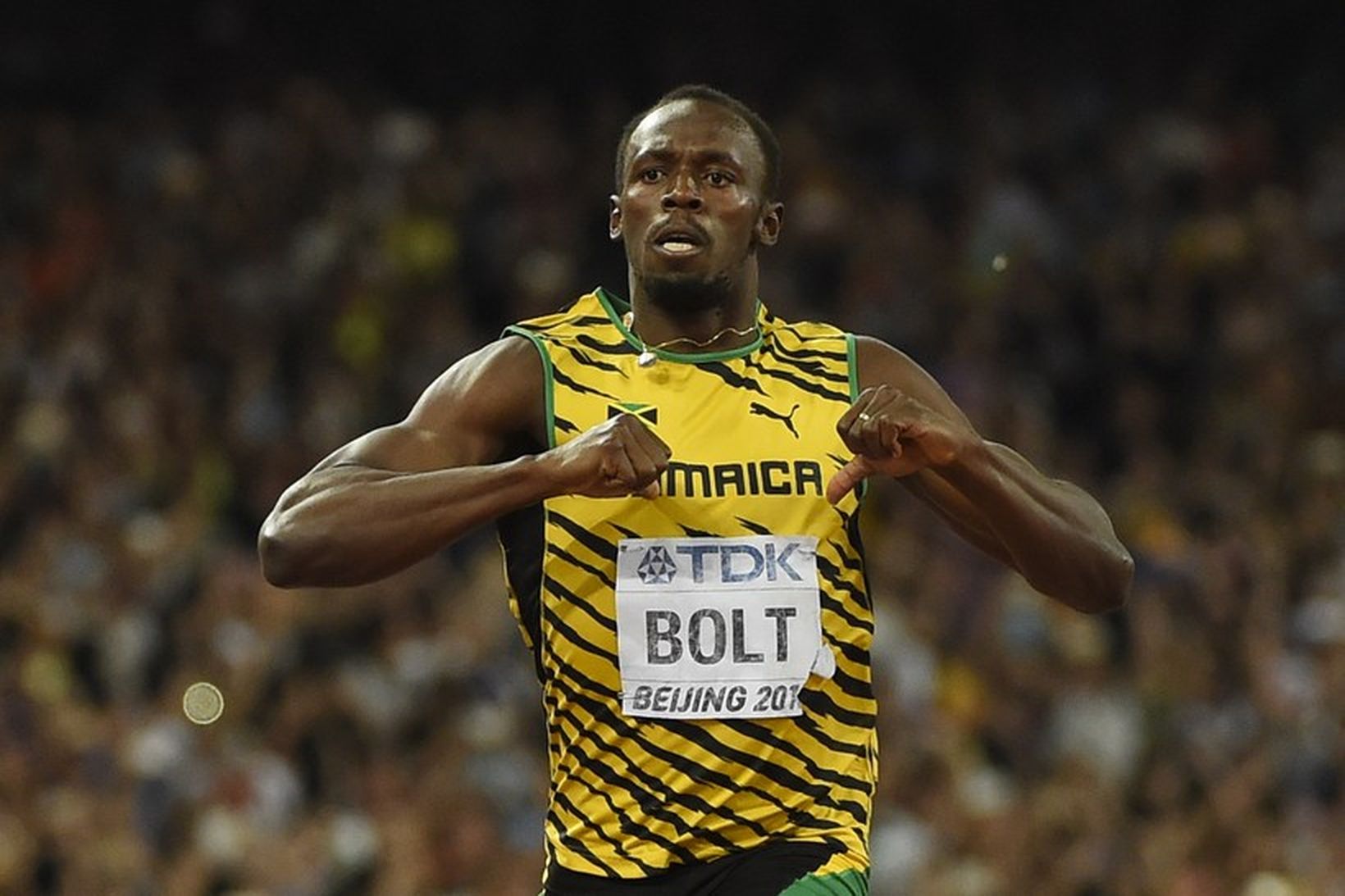Usain Bolt fagnar hér heimsmeistaratitlinum í 200 metra hlaupi.