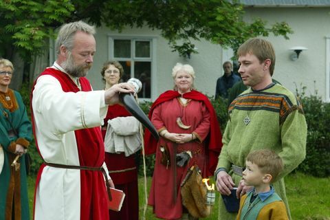 High Chieftain Hilmar Örn Hilmarsson on the left at an Ásatrú ceremony.