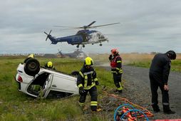 Emergency response exercise involving Coast Guard helicopters.