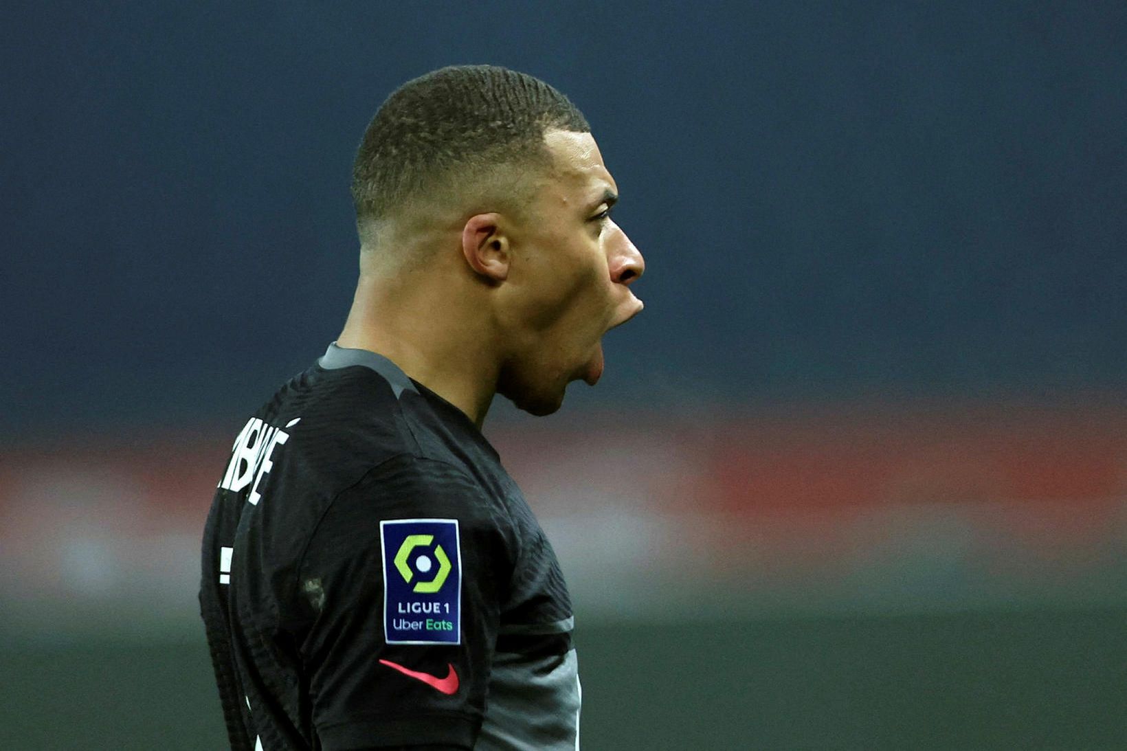 Kylian Mbappé fagnar vel í kvöld.