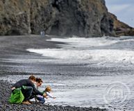 Erlendir ferðamenn í  Reynisfjöru