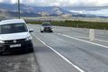Sektar Ómerktur lögreglubíll við Grundartanga mælir hraða bíla.