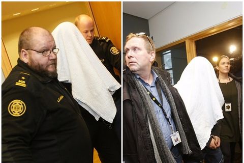 The suspects covering their faces upon being taken into custody today.