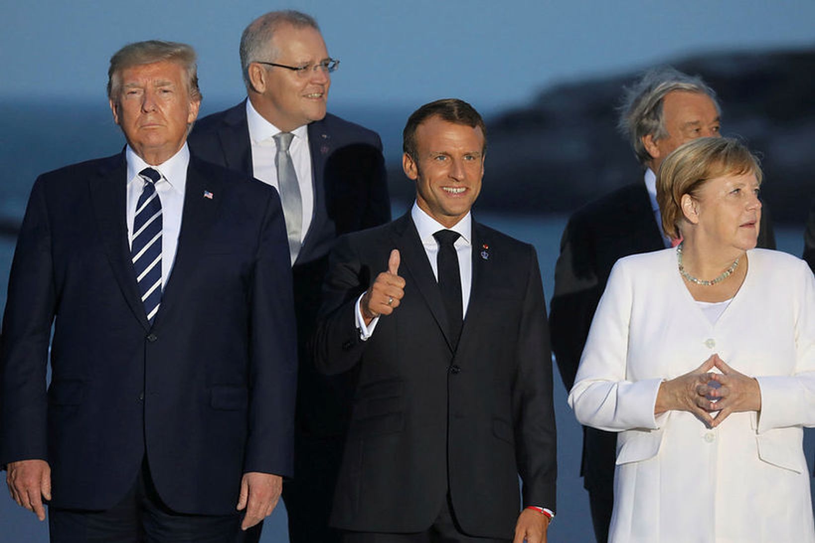 Donald Trump Bandaríkjaforseti með þeim Emmanuel Macron Frakklandsforseta og Angelu …