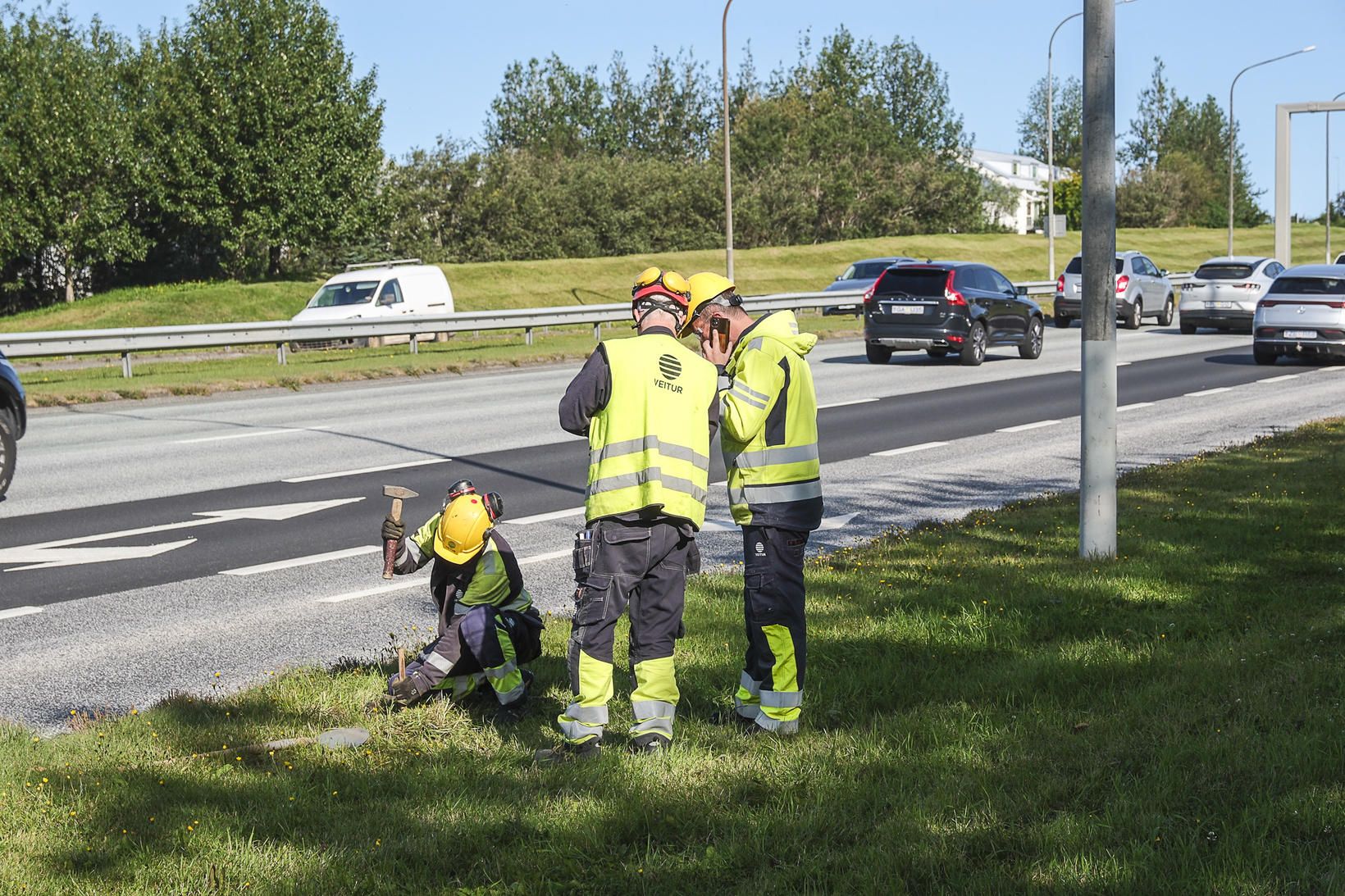 Starfsmenn Veitna við störf á höfuðborgarsvæðinu í sumar.