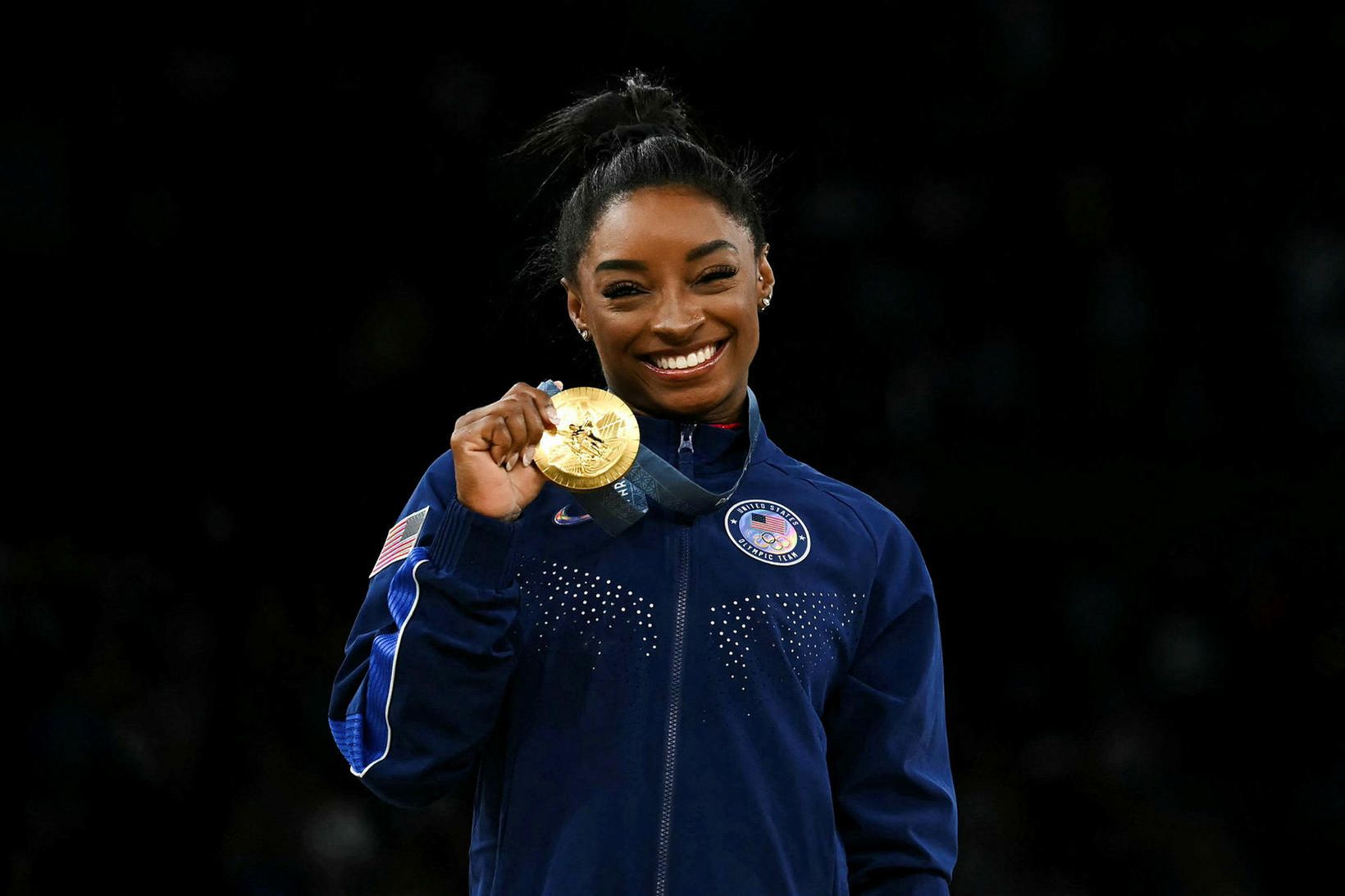 Fimleikakonan Simone Biles vann fjögur verðlaun á Ólympíuleikunum, þrjú gull …