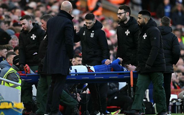 Wes Burns borinn af velli á Anfield á laugardag.