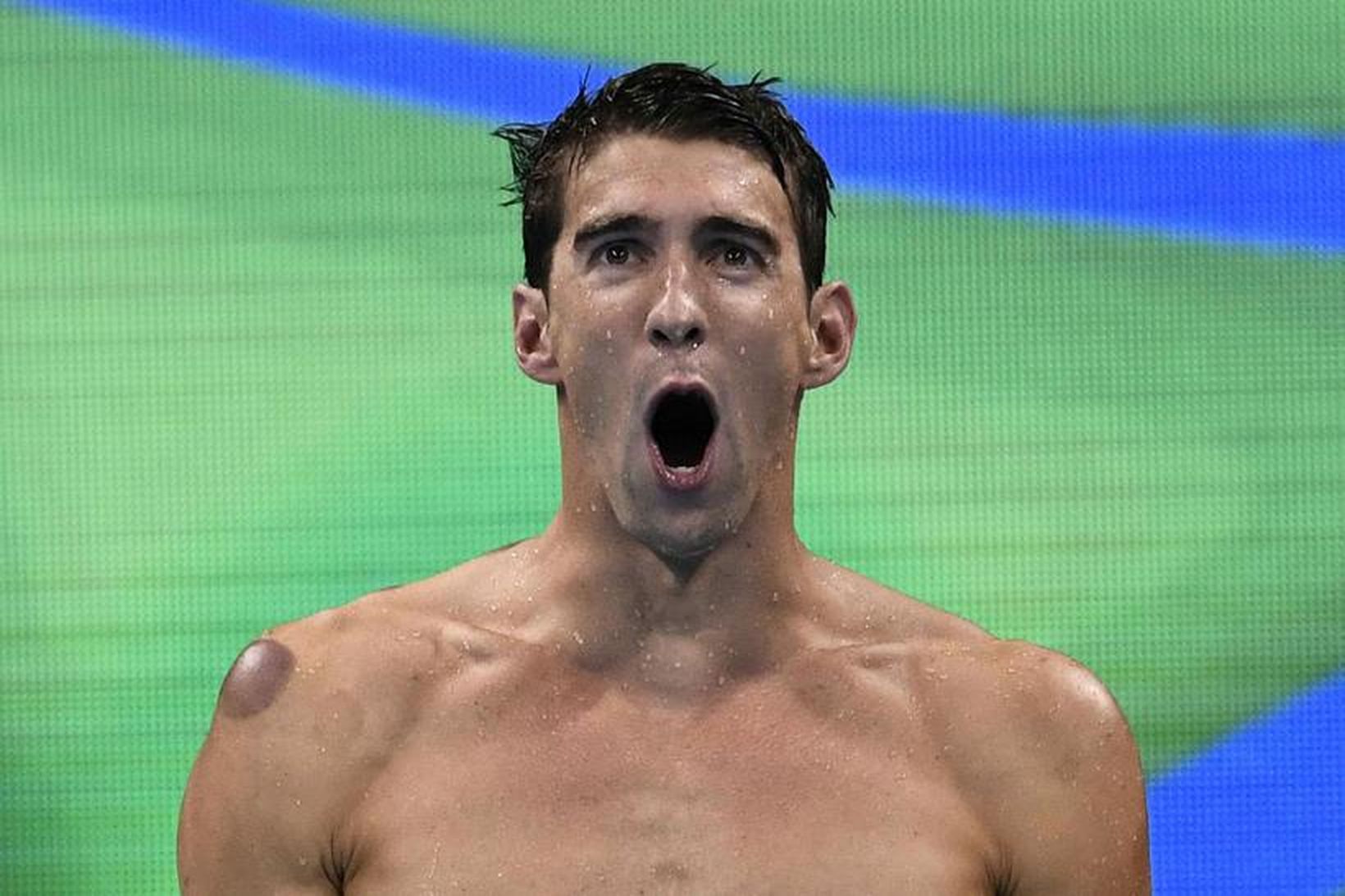 Michael Phelps sem tryggði sér sitt 19. ólympíugull í gær, …