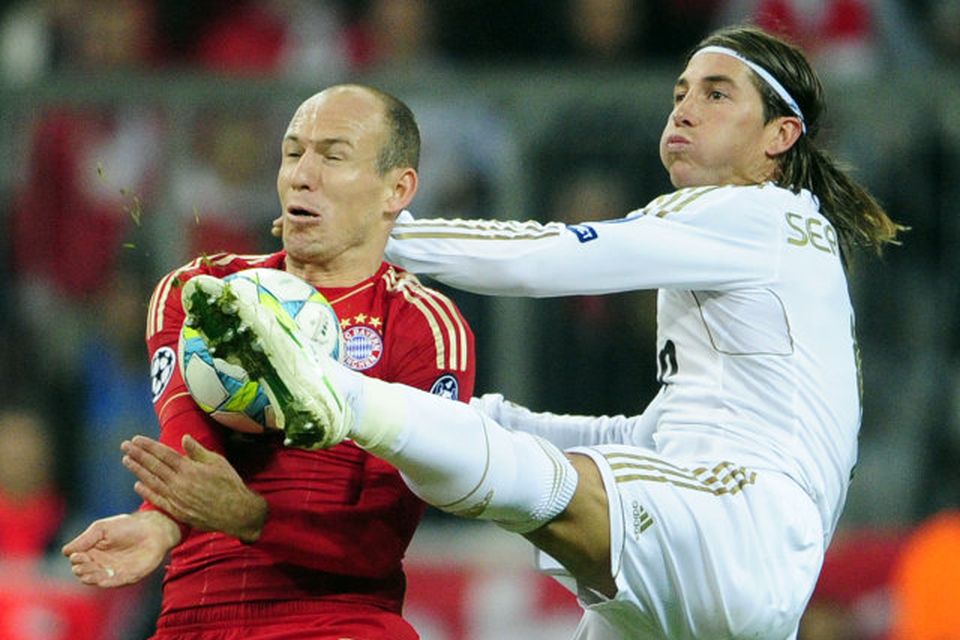 Arjen Robben og Sergio Ramos í hörðum slag.