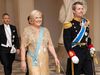 The President of Iceland, Halla Tómasdóttir with King Frederik X at Kristjánsborg Palace for the celebratory dinner. Her husband, Björn Skúlason, is walking behind her.