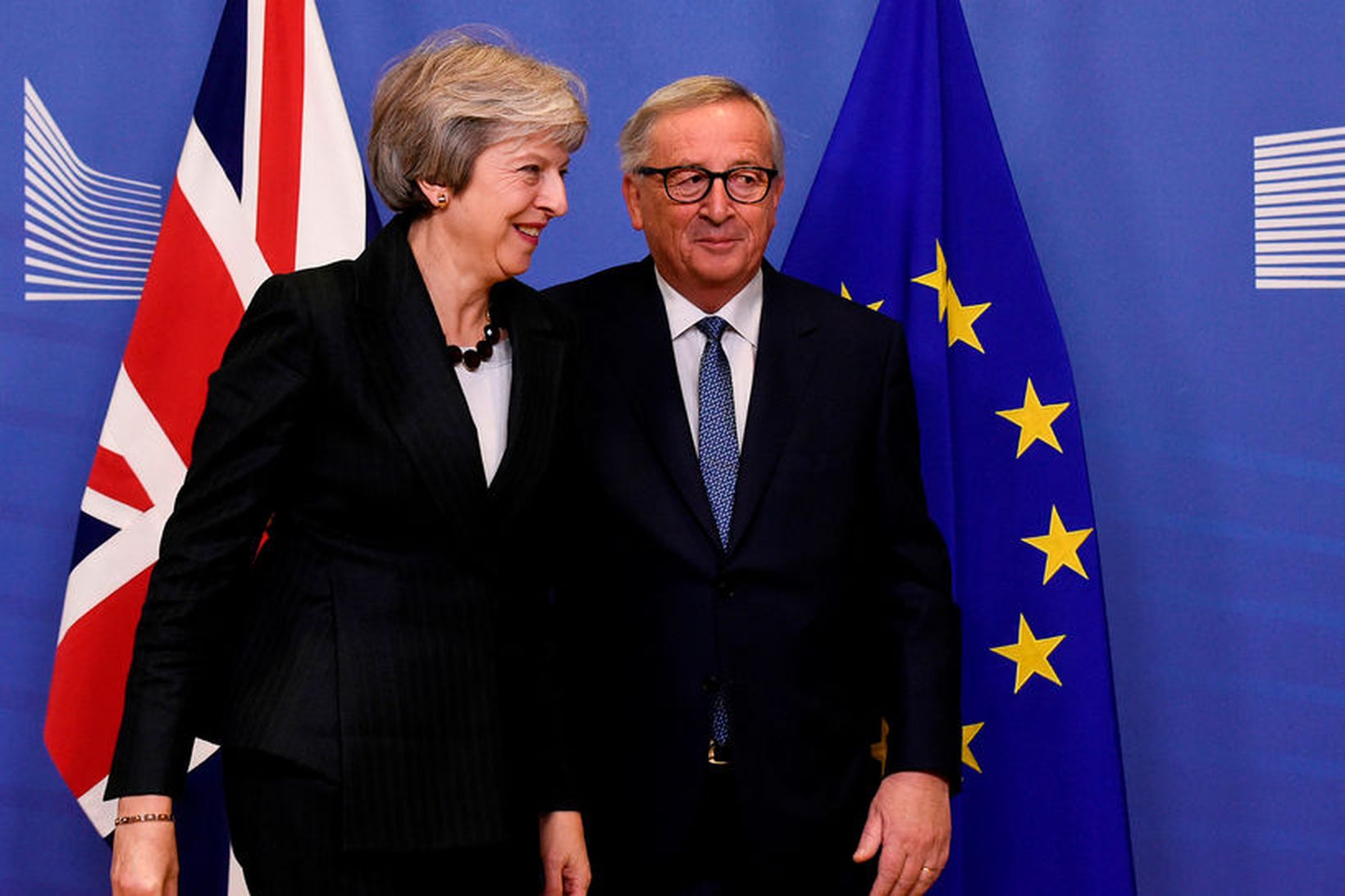 Jean-Claude Juncker, forseti framkvæmdastjórnar ESB, og Theresa May, forsætisráðherra Bretlands, …