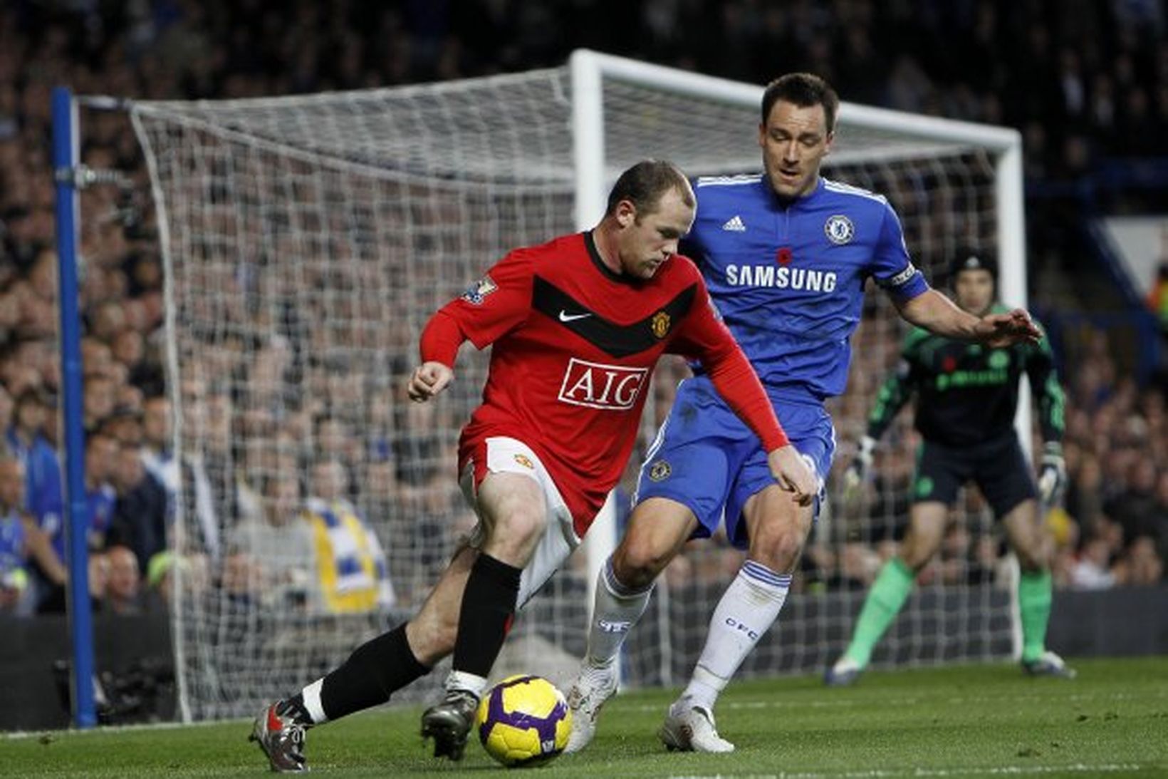 John Terry og Wayne Rooney í baráttunni á Stamford Bridge …