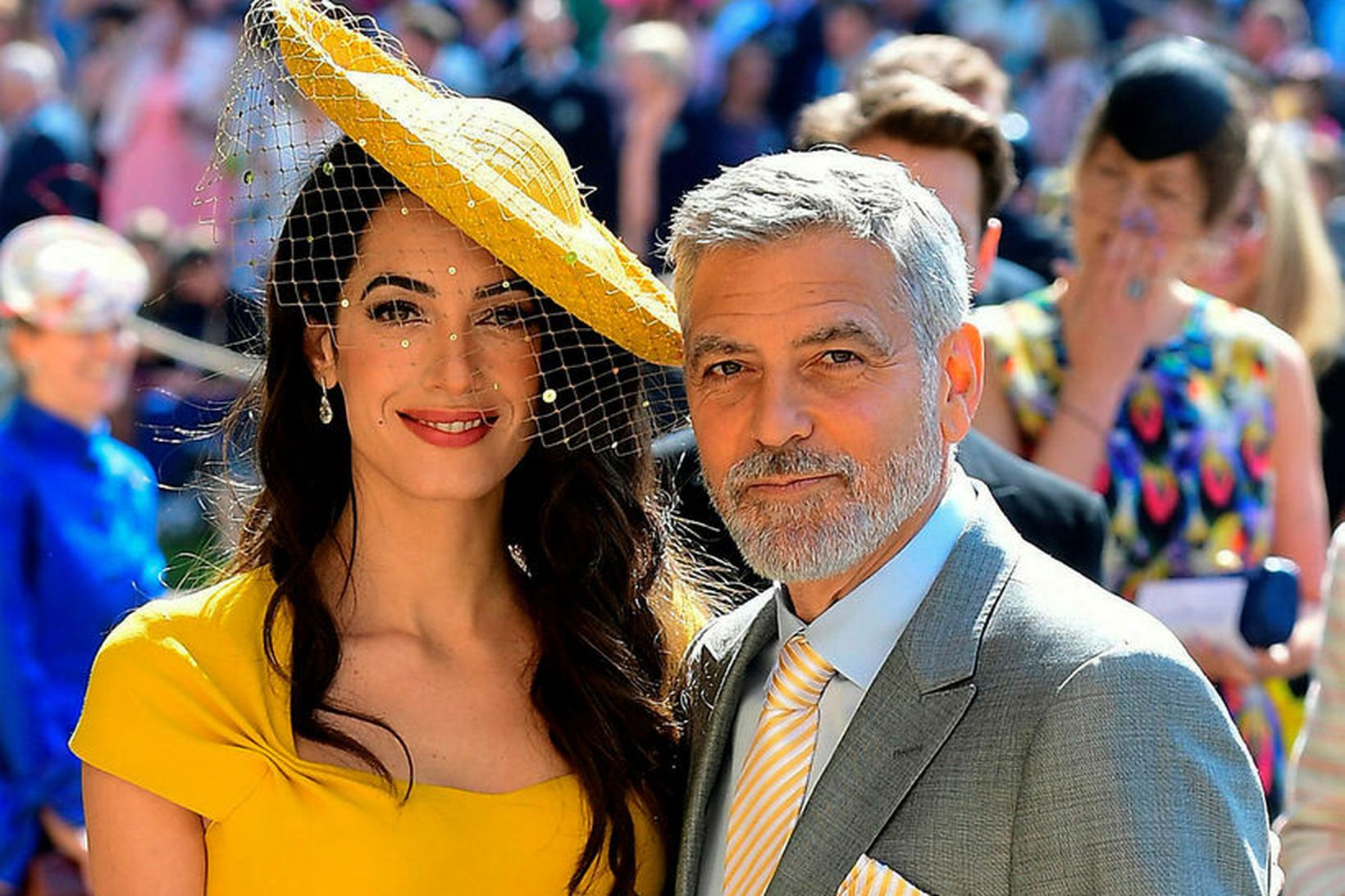 Amal og George Clooney í brúðkaupi Harry og Meghan í …