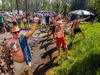 Before entering the sweat lodge, thanks are given to the directions, each of which has its own meaning. In the photo, participants face west and thank the elves and trolls for assisting them in the day&#8217;s sweat.