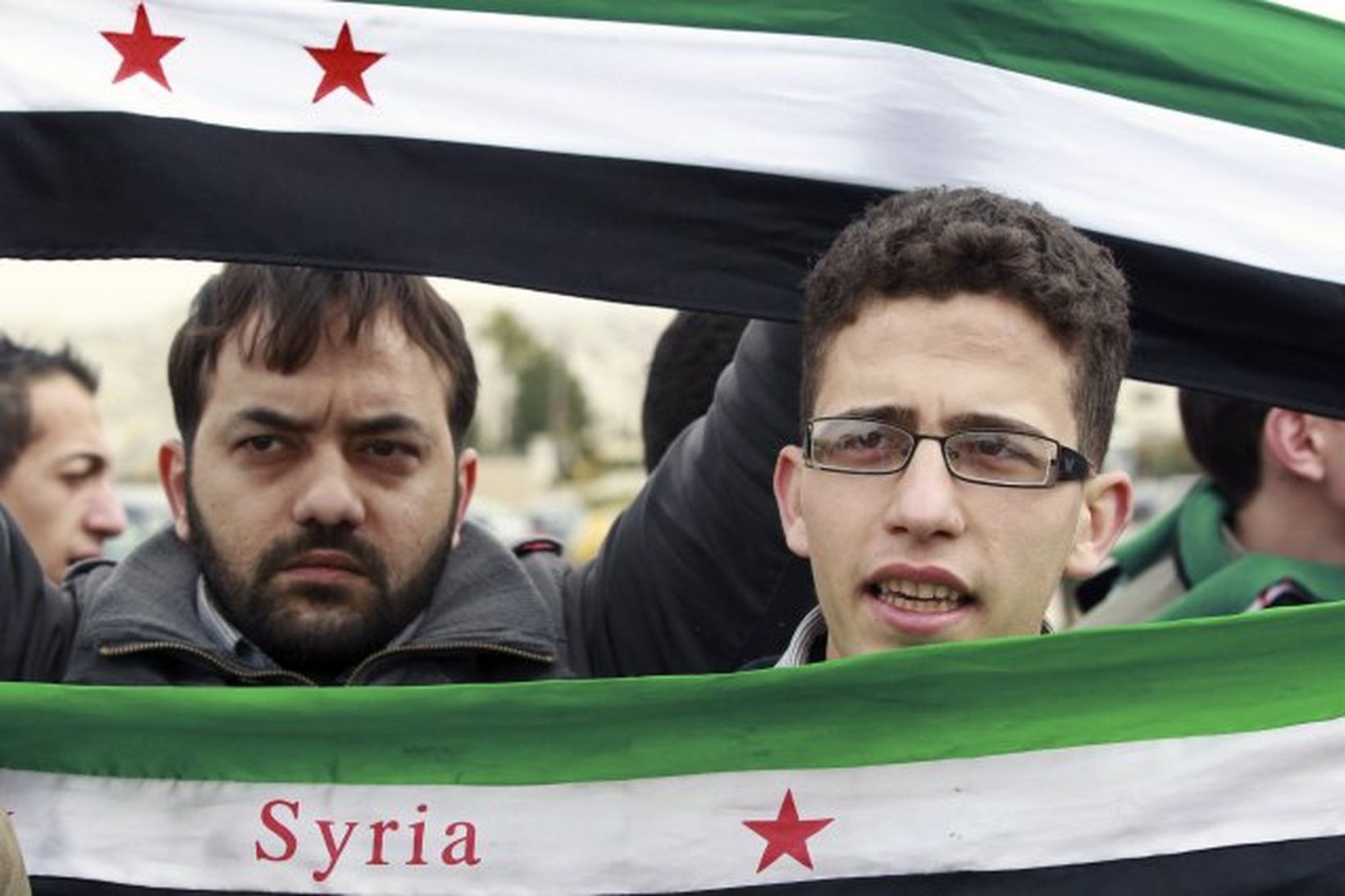 Sýrlendingar mótmæla Bashar Al-Assad forseta landsins.