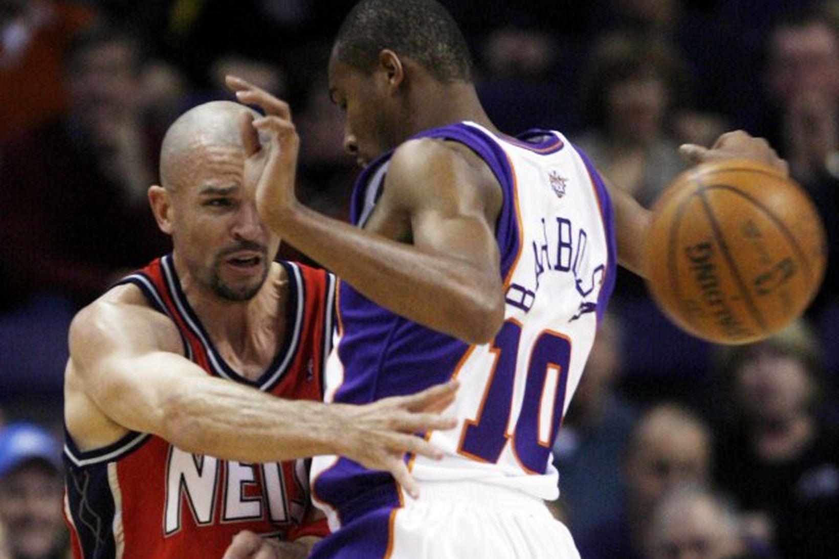 Jason Kidd leikmaður Nets og Leandro Barbosa.