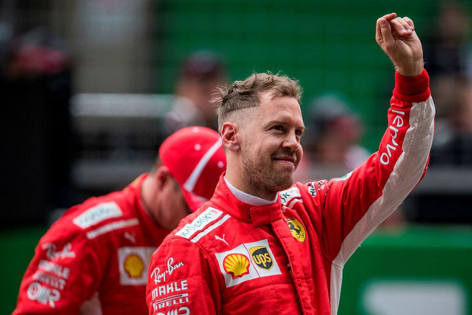 Sebastian Vettel ánægður eftir tímatökuuna í Sjanghæ.
