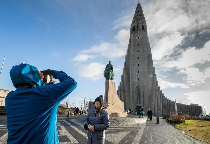 Tourists at Hallgrímskirkja church in central Reykjavik.