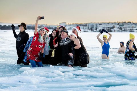 What a time for a selfie in the icy sea on New Years Day with your fellow swimmers.
