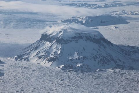 The mountain Herðubreið in winter clothing.