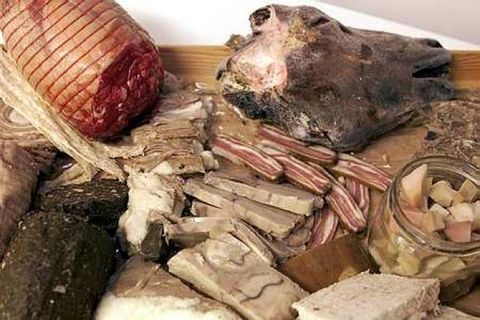 Þorramatur, traditional Icelandic food which will be widely enjoyed today. Here you can see Hangikjöt ( smoked lamb), sheep's head, blood pudding, shark and liver sausage.