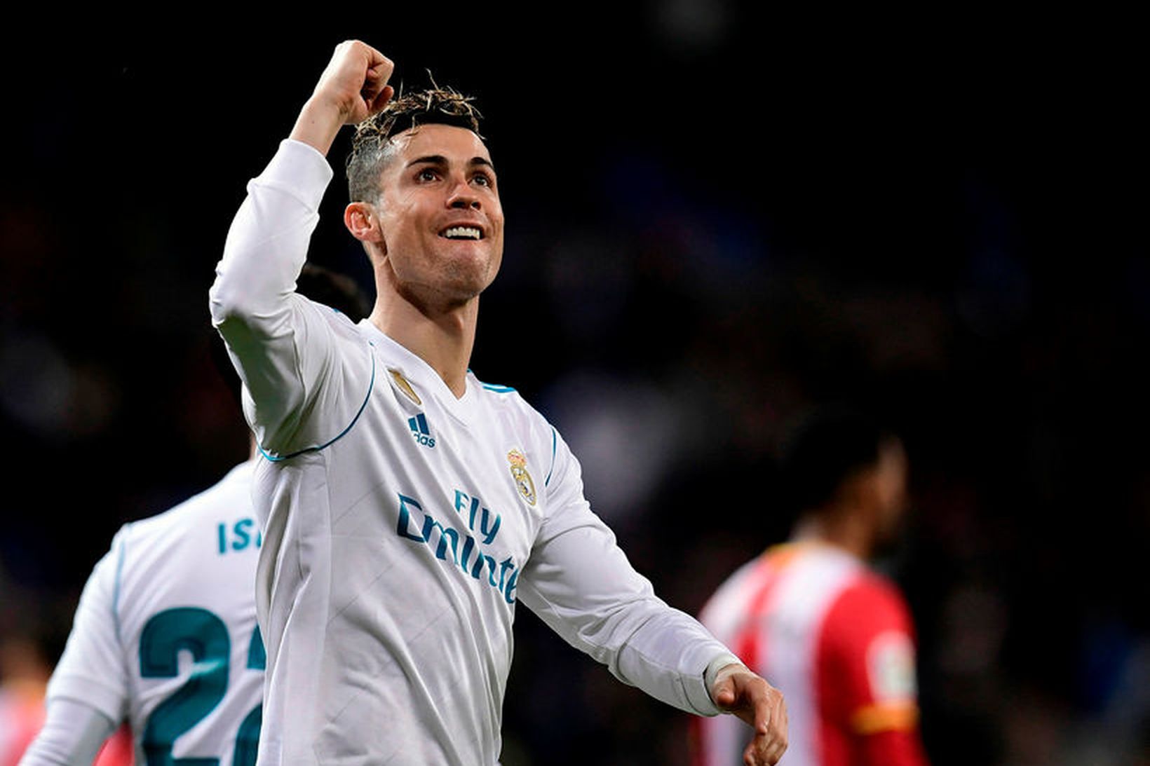Cristiano Ronaldo fagnar fjórða marki sínu gegn Girona um síðustu …