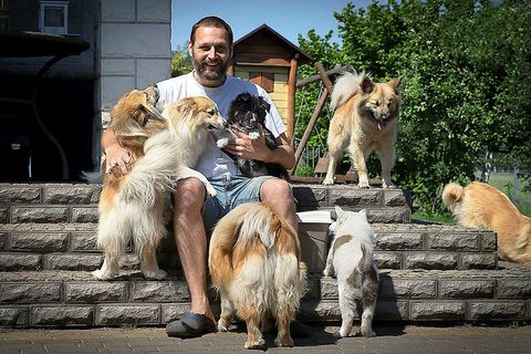 Mariusz Kopieccy, in good company in his backyard in Konin, Poland.