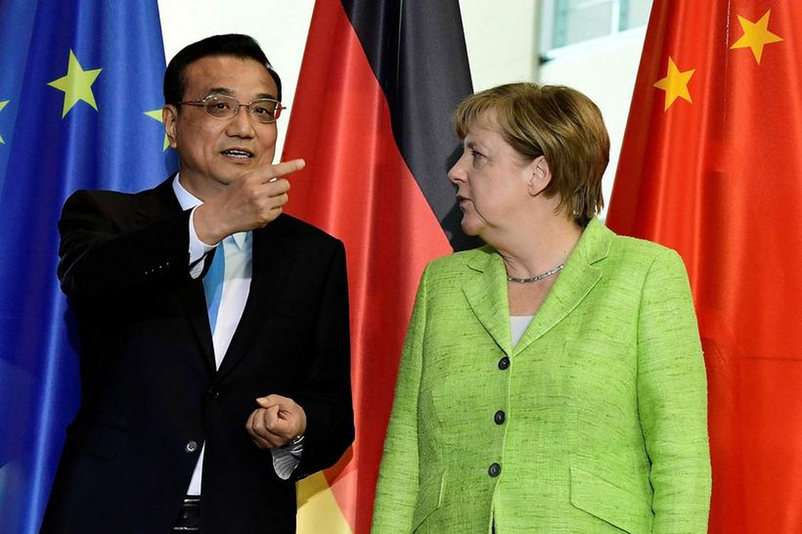 Li Keqiang, forsætisráðherra Kína, og Angela Merkel, kanslari Þýskalands, hittust …