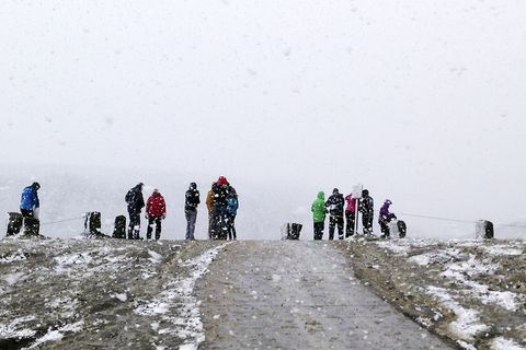 Tourists braving the cold at Víti in the Icelandic highlands at the weekend.