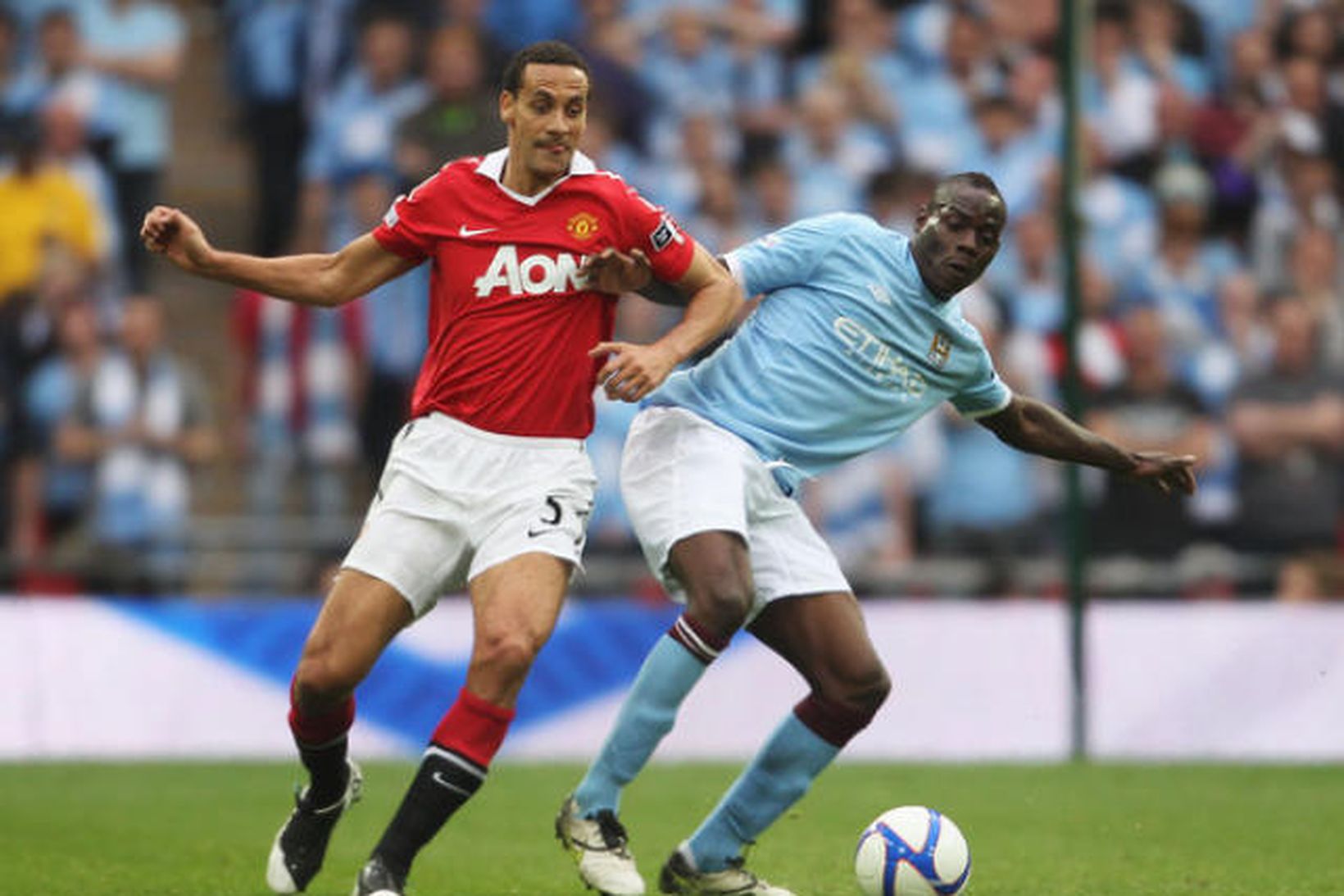 Rio Ferdinand og Mario Balotelli.