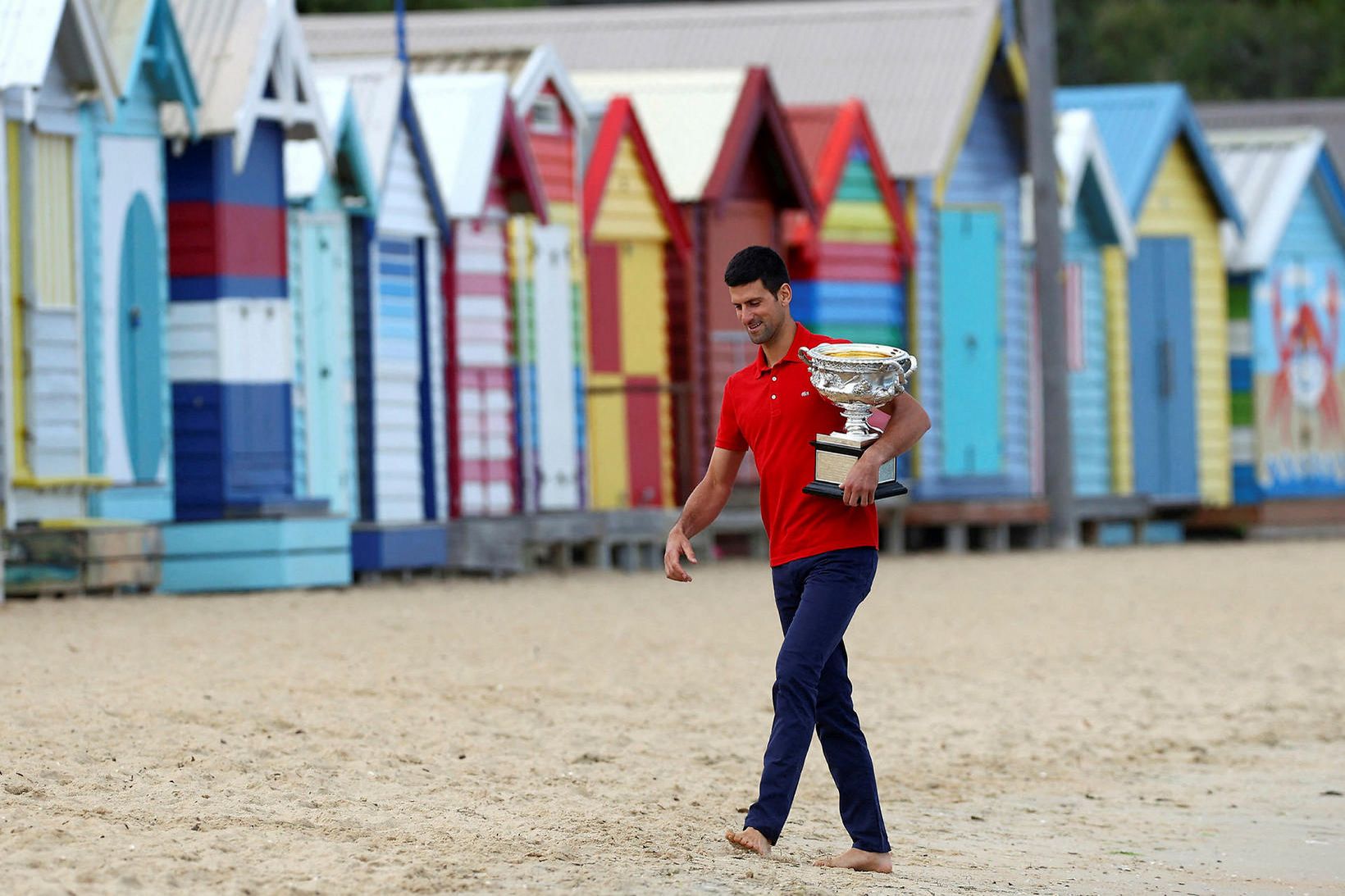 Novak Djokovic vann á sínu átjánda risamóti á ferlinum um …