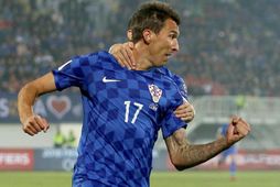 Mario Mandzukic fagnar í kvöld. Hann gerði þrennu fyrir Króatíu.